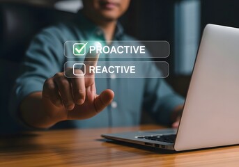 Man selecting proactive option on laptop screen with finger pointing at the interface choice