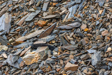 Rugged rocks in mountainous outdoor setting during daytime