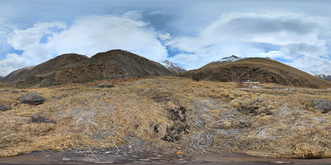 Spherical HDRi panorama of early spring mountains gorge at sunny afternoon in Kyrgyzstan
