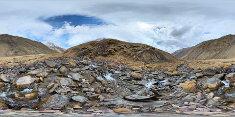 360 Spherical Panorama of Mountain river with boulders at springtime in mountain gorge at sunny afternoon