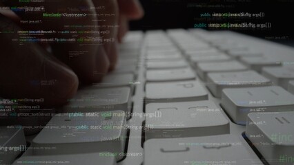 A close-up view of hands actively typing on a sleek keyboard surrounded by floating programming code and digital syntax, emphasizing modern technology and software creation. Xenic
