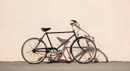 Fototapeta premium Minimalist bicycle photo with pastel wall and sharp sunlight shadows