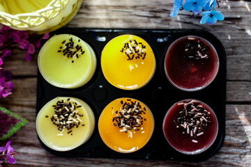 Tasty desserts in brown muffin liners. Dessert