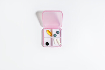 Pink Pill Organizer with Assorted Pills