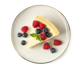Piece of delicious cheesecake with fresh berries and mint isolated on white, top view