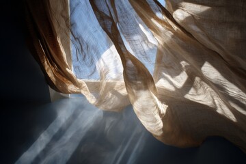 Sheer curtains billow gently as soft sunlight streams in, illuminating the peaceful interior of a cozy space during a tranquil morning