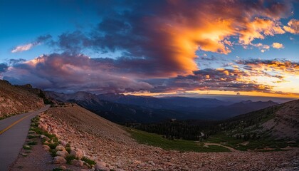 colorful clouds over trail ridge road with longs peak in the distance