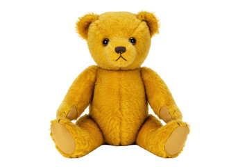 Isolated cute golden plush teddy bear, small black eyes and embroidered nose, soft and cuddly