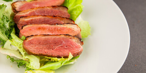 Duck breast roast poultry fresh natural product tasty snack delicious gourmet food background on the table rustic top view copy space