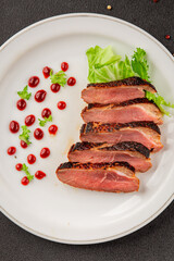 Duck breast roast poultry fresh natural product tasty snack delicious gourmet food background on the table rustic top view copy space