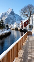 Fototapeta premium Snow blankets the landscape as mountains rise above a tranquil body of water, creating a serene winter scene with lovely homes
