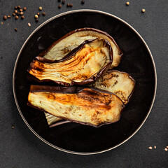 Baked eggplant grilled vegetables fresh natural product tasty snack delicious gourmet food background on the table rustic top view copy space keto and paleo diet vegan and vegan food