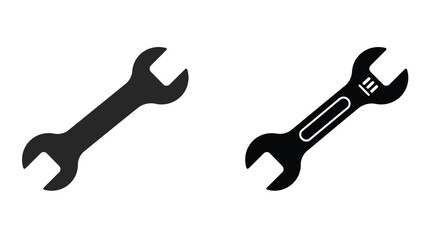 Two wrench icons one solid one with internal detail shown