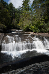 Turtleback falls, waterfall, located in the Nantahala National Forest near Lake Toxaway and Cashiers, North Carolina, vertical