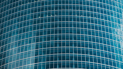 mirrored windows of the facade of an office building