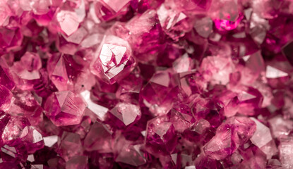 Amethyst garnet crystals. Burgundy gemstone. Mineral crystals in the natural environment. Texture...
