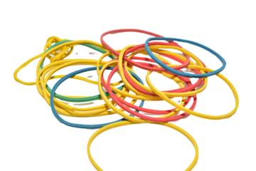 Colored rubber bands lie on a PNG background.
