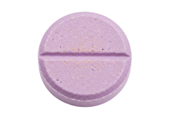 Round purple pill isolated on transparent background, single tablet with score line for medication and pharmaceutical use