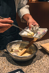 Chef Preparing Tempura Batter for Japanese Cuisine