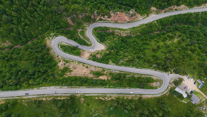 a winding road - a serpentine in the mountains leading to the Dzhily-su tract, where cars drive