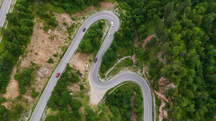 a winding road - a serpentine in the mountains leading to the Dzhily-su tract, where cars drive
