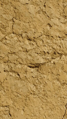 Historic mud brick archaeological ruins surface.