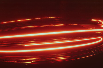 Abstract red light trails on dark background