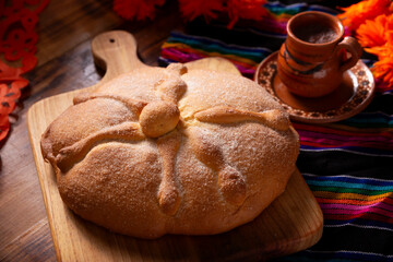 Pan de Muerto. Typical Mexican sweet bread that is consumed in the season of the day of the dead. It is a main element in the altars and offerings in the festivity of the day of the dead.