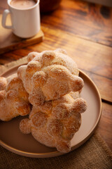 Pan de Muerto. Typical Mexican sweet bread that is consumed in the season of the day of the dead. It is a main element in the altars and offerings in the festivity of the day of the dead.
