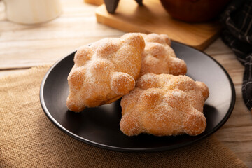 Pan de Muerto. Typical Mexican sweet bread that is consumed in the season of the day of the dead. It is a main element in the altars and offerings in the festivity of the day of the dead.