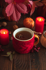 Cozy Autumn Scene with Mulled Wine, Candles, Pumpkins and Seasonal Decor