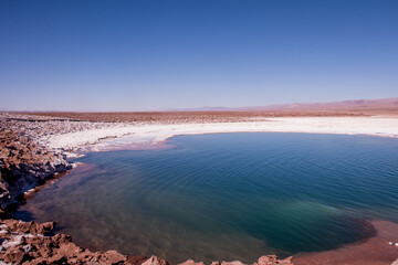 Crystal clear waters of Baltinache Lagoons in a desert region, San Pedro de Atacama, Chile