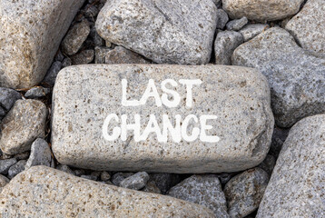 Last chance symbol. Concept word Last chance on beautiful grey stone on stone beach. Beautiful grey stone beach background. Business last chance concept. Copy space.