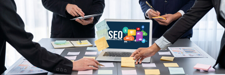 Analyst team use sticky note for creative and analytic brainstorm for business idea with BI data dashboard on laptop screen. Analysis financial data visualization tech for marketing strategy. Prodigy