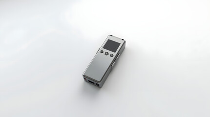 Fototapeta premium A sleek, modern silver voice recorder resting on a clean, white surface, highlighting its design and functionality.