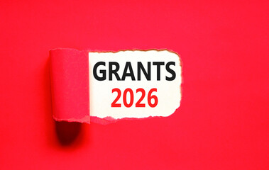 Grants 2026 symbol. Concept words Grants 2026 on beautiful white paper. Beautiful red paper background. Business and grants 2026 concept. Copy space.