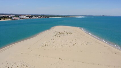Aerial view of the beautiful beaches and marinas of El Rompido in the province of Huelva, Andalusia, Spain.
