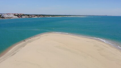 Aerial view of the beautiful beaches and marinas of El Rompido in the province of Huelva, Andalusia, Spain.