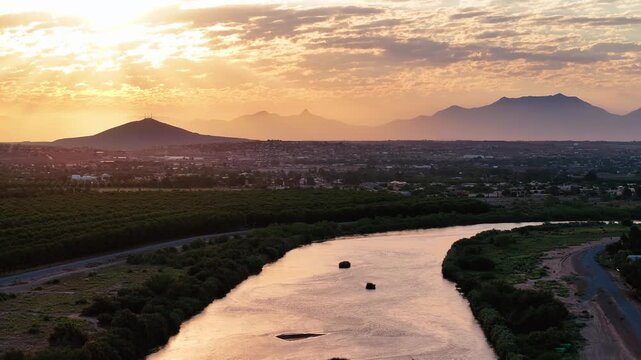 Pull view of Organ Mountains over Rio Grande River