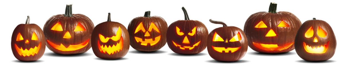 Halloween jack-o-lanterns isolated on white. Pumpkins with carved spooky faces