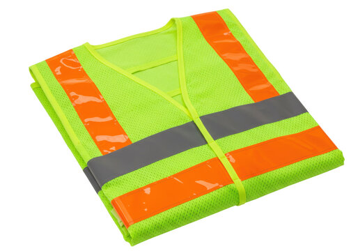 Folded neon yellow safety vest with reflective stripes isolated, high visibility workwear for construction and traffic control