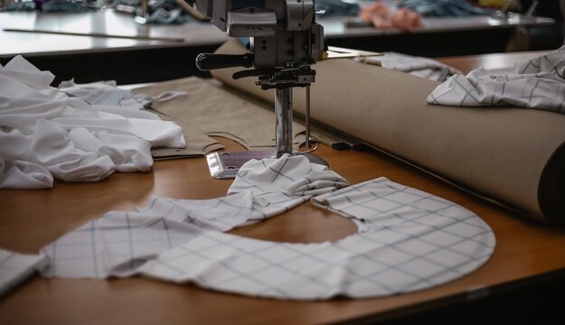 Industrial Fabric Cutting Machine in Tailoring Workshop