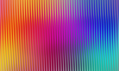 Vibrant abstract background with vertical iridescent lines transitioning through a colorful spectrum, dynamic and fluid background