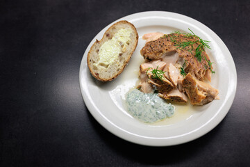 Smoked salmon with dill and bread on a white plate with copy space