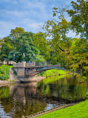 Bastejkalna Park and Daugava canal in center of Riga. Park with bridges in Riga old town. Touristic place