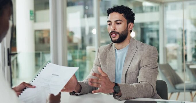 Business, people and interview with document in office for discussion, hiring process and policy. Man, talking and candidate listening with paperwork, review resume and explain recruitment of vacancy
