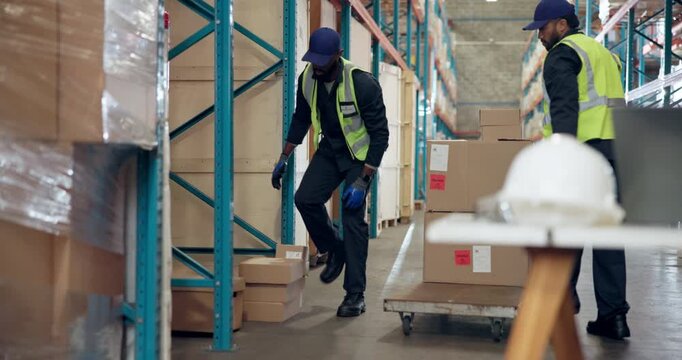 People, packing and boxes on cart at warehouse for distribution, shipping and inventory management. Men, team and loading package for logistics, industrial stock and inspection for quality assurance