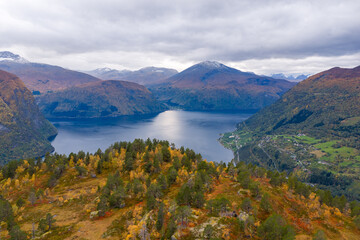 Beautiful autumn colors in the mountains, with the fjord in the background. Norwegian nature at its best.
