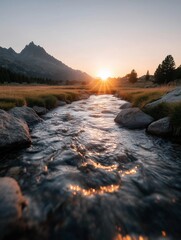 A stream running through a grassy field with a mountain in the background