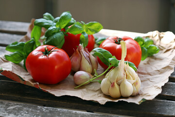 large tomatoes with basil and garlic